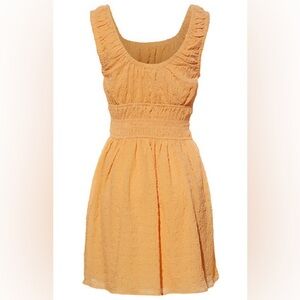 SLEEVELESS RUCHED MINI DRESS